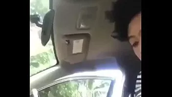 play Cute indonesian girl with big tits sucks on dick in the car